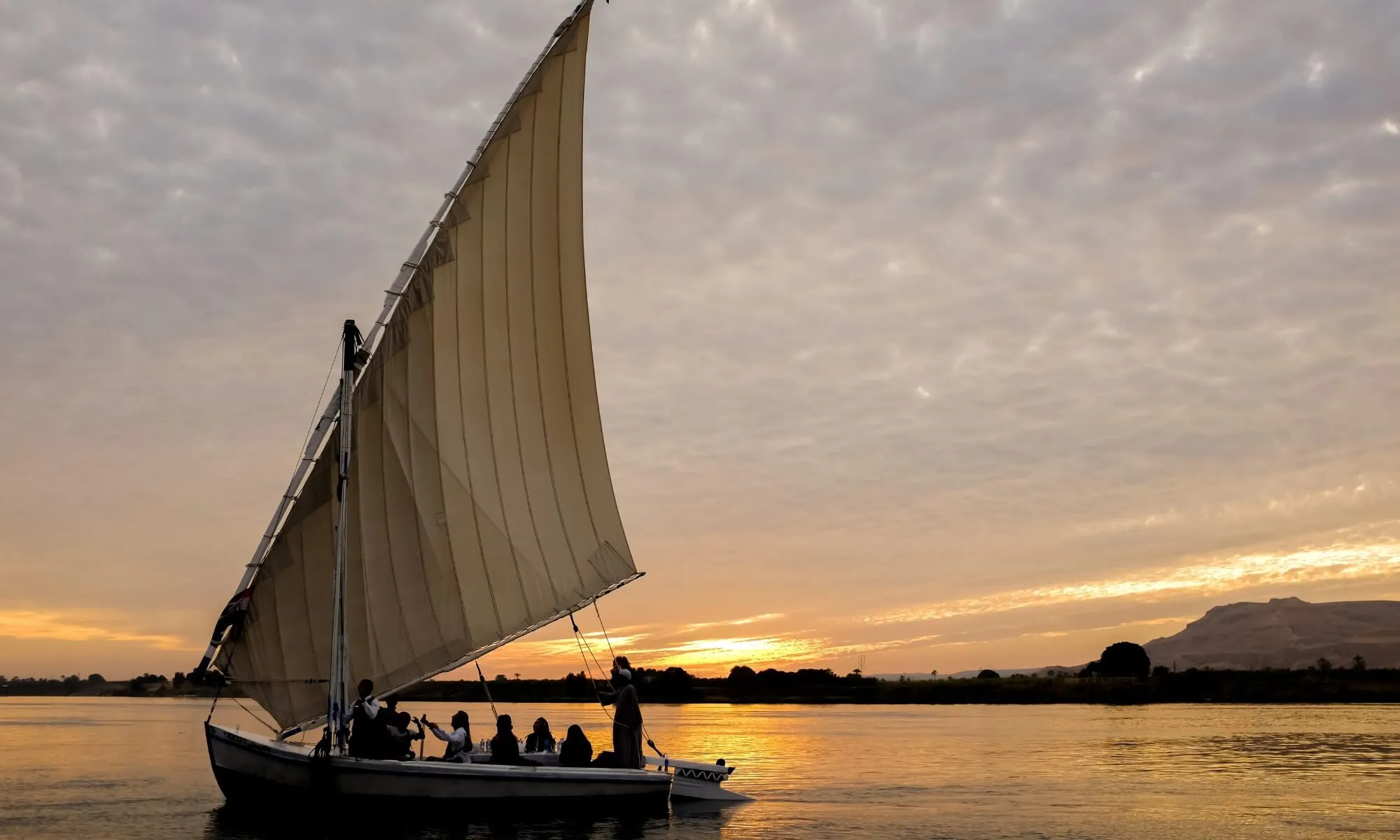 Sunset Felucca Ride on the Nile in Aswan-Nile Cruise Holiday(1).webp